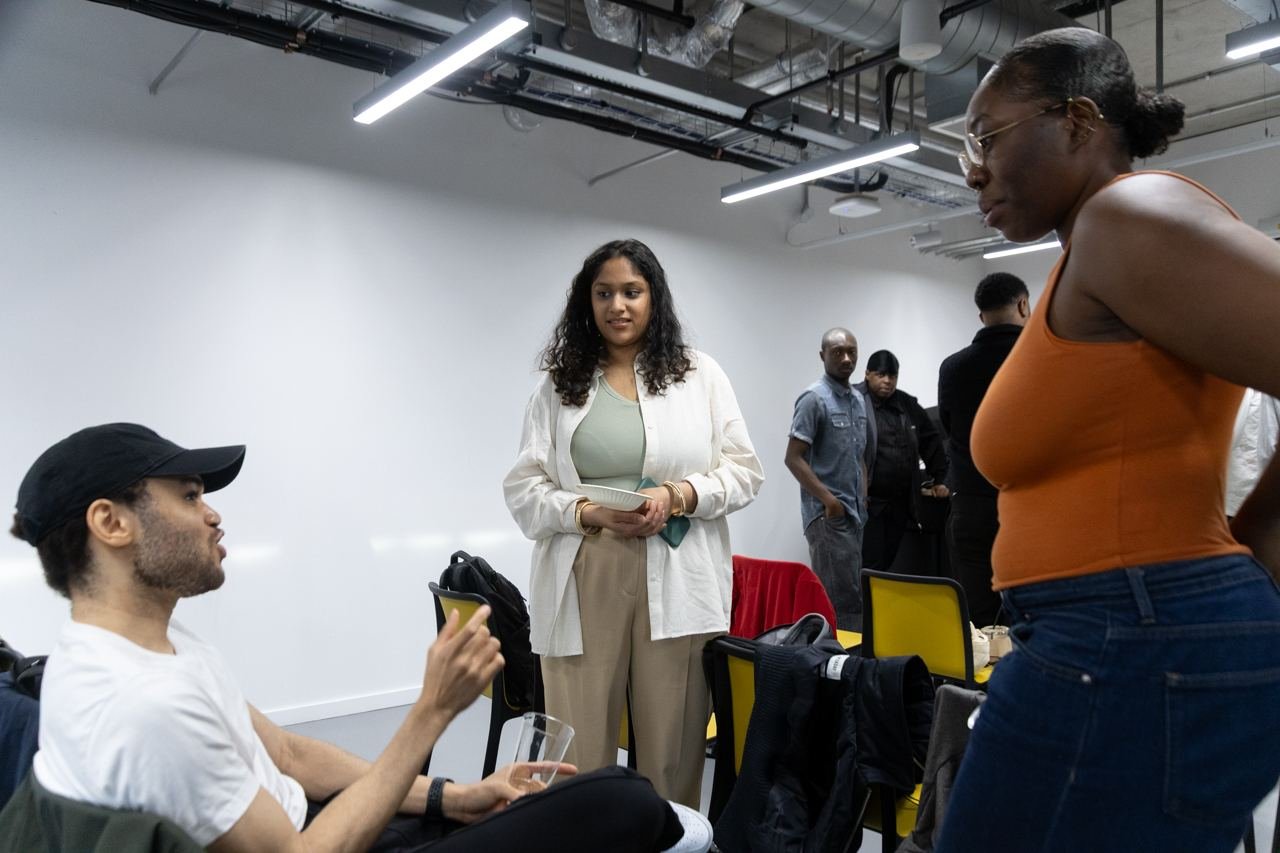 Students chatting over food after a session.
